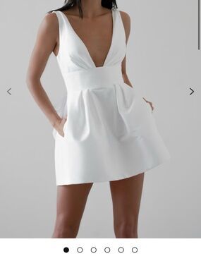 Plunging V-Neck White Mini Dress with Pockets